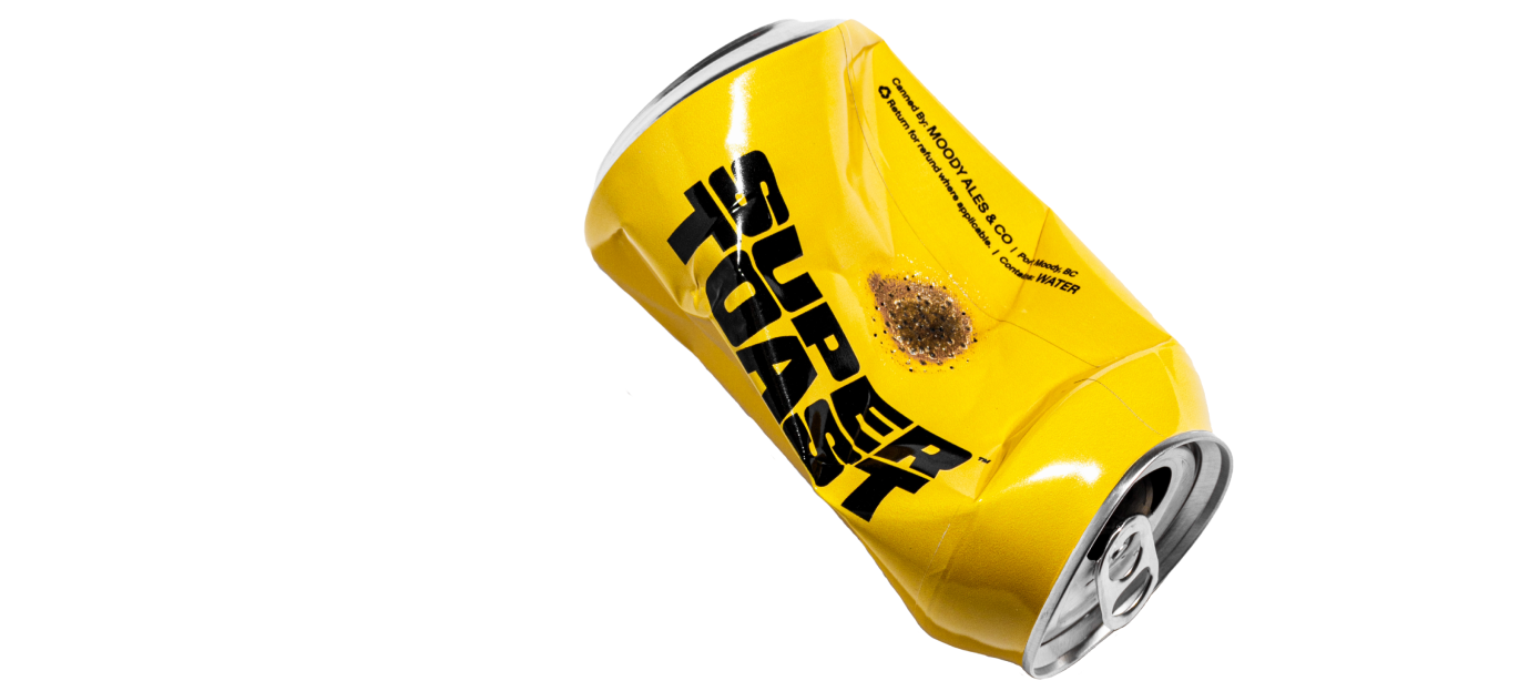 pipe made out of a crushed yellow super toast can