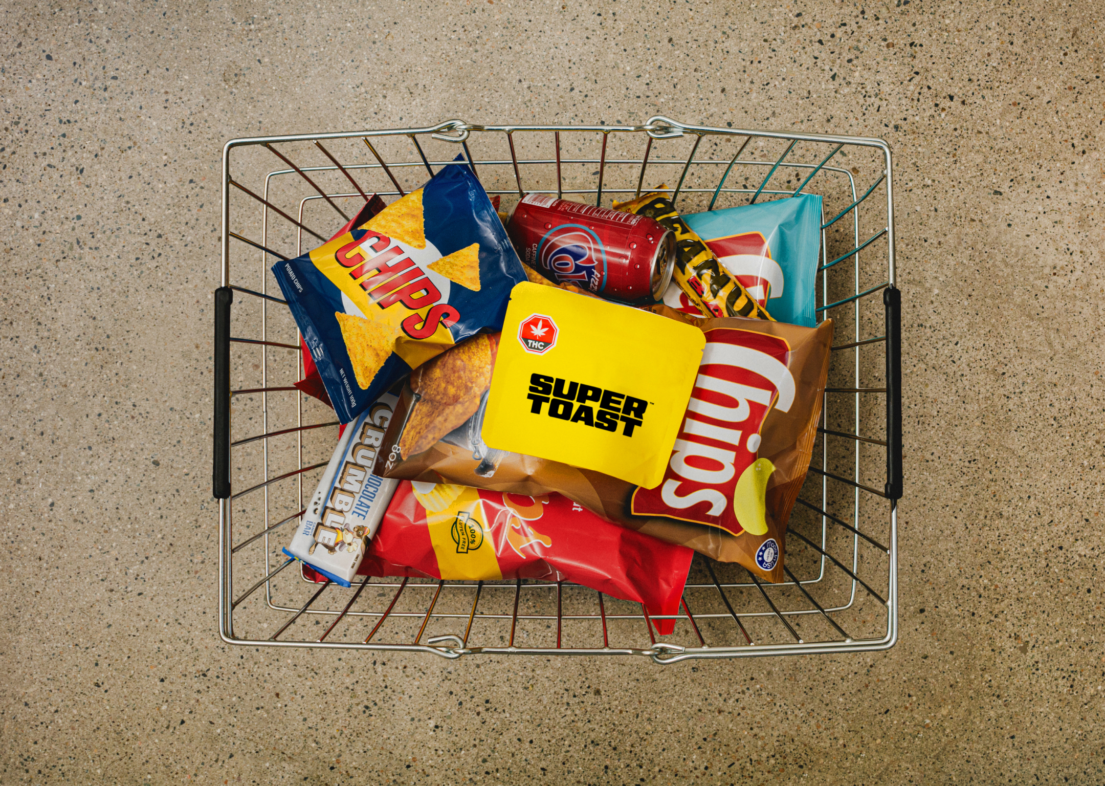 super toast packaging in shopping cart with chip bags